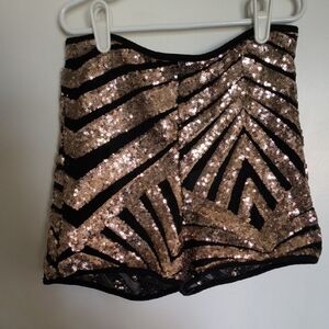 a'gaci Gold Sequin High Waist Shorts with Black Stripe Detail